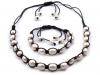 Necklace and bracelet of freshwater pearls set on leather cord