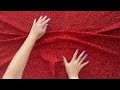 Decorative shimmering fabric with a metallic shiny surface